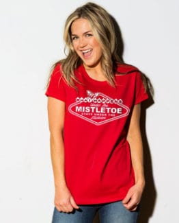 What Happens Under The Mistletoe Stays Under The Mistletoe Graphic T-Shirt - red shirt design on a model