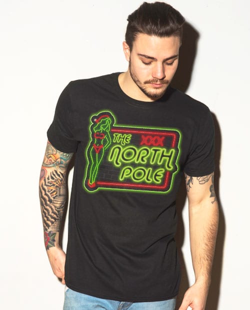 The North Pole Neon Sign Graphic T-Shirt - black shirt design on a model