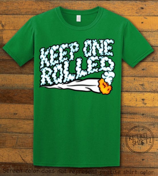 This is the main graphic design on a green shirt for the Weed Shirt: Keep One Rolled
