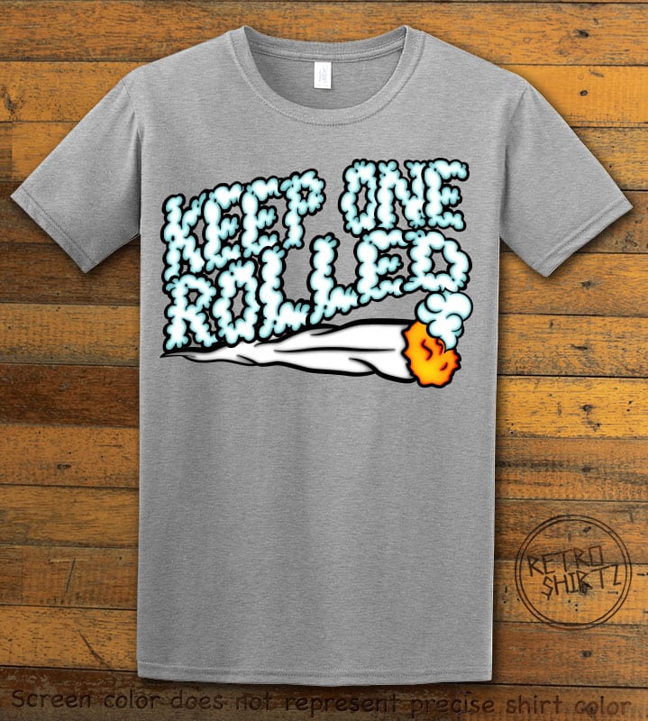 This is the main graphic design on a gray shirt for the Weed Shirt: Keep One Rolled