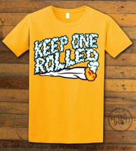 This is the main graphic design on a yellow shirt for the Weed Shirt: Keep One Rolled