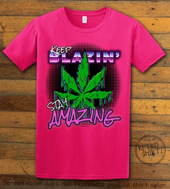 This is the main graphic design on a pink shirt for the Weed Shirt: Keep Blazin' Stay Amazing